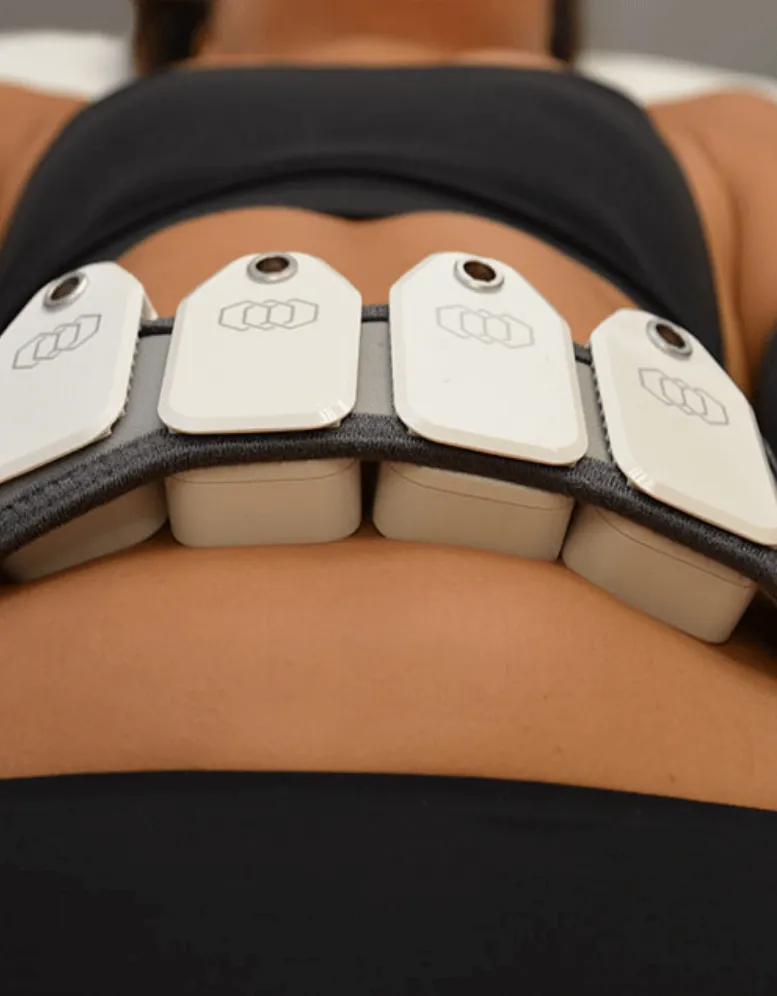 A close-up view of a person wearing a back posture corrector designed as a brace around the shoulders by a Sexual Health Expert in Los Angeles.