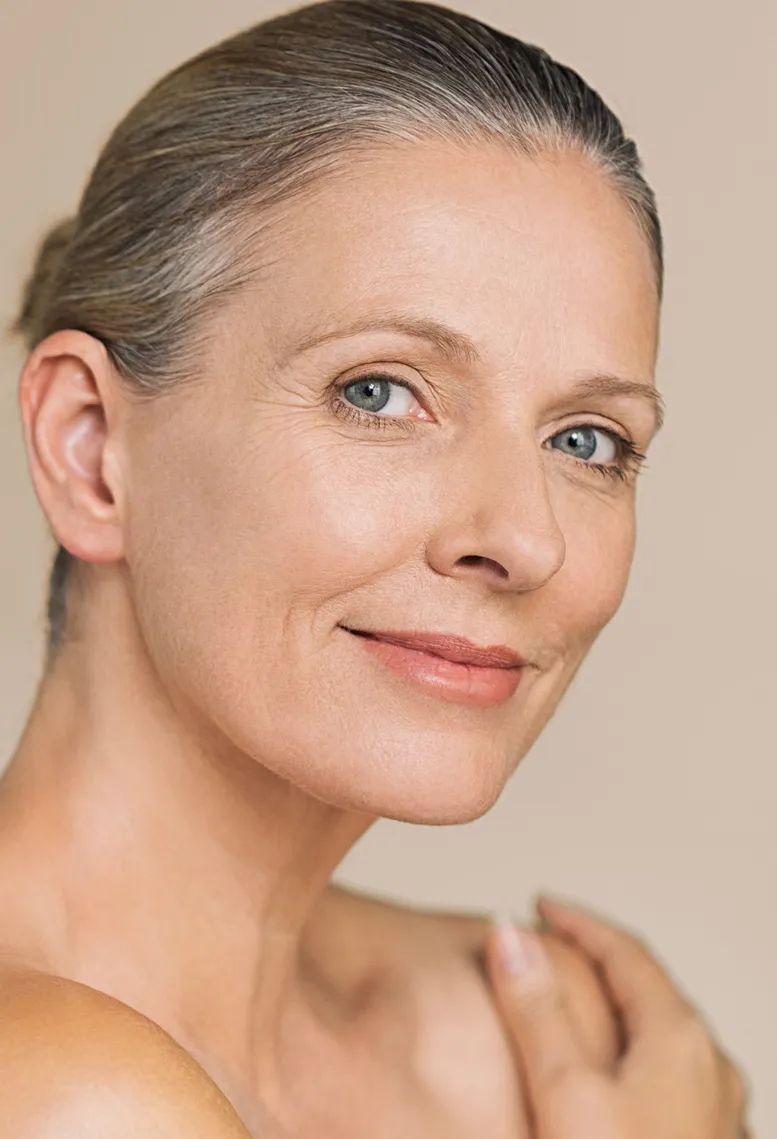 Portrait of a middle-aged Sexual Health Expert in Los Angeles with a serene expression, showcasing clear skin and bright eyes with a subtle smile.