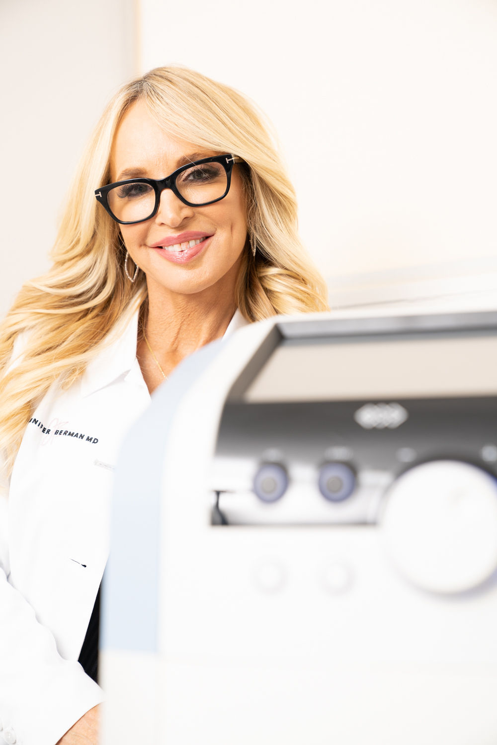 Dr. Jennifer Berman performing HydraFacial treatment for glowing, rejuvenated skin. Call (310) 772-0072 to book your HydraFacial session now!